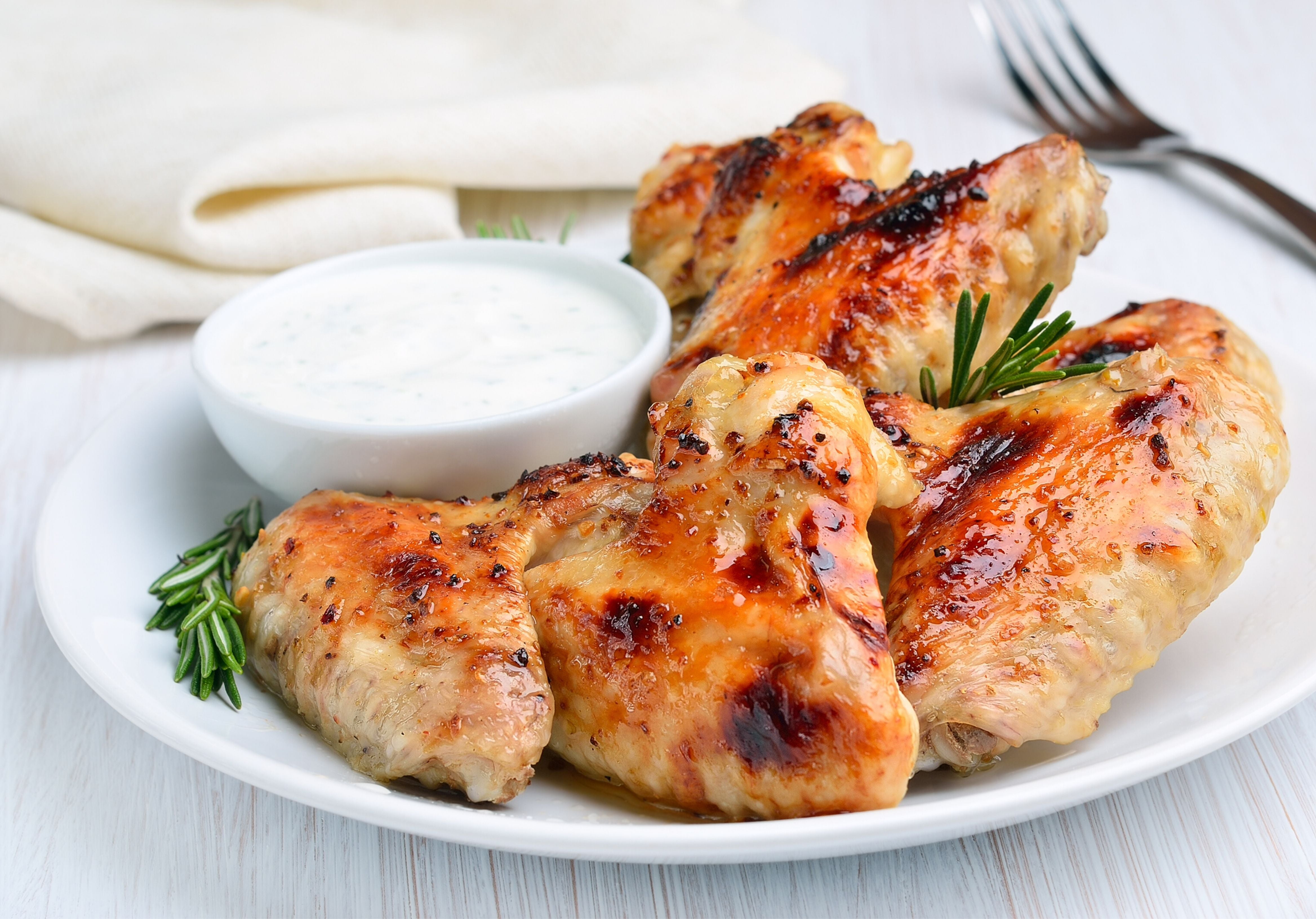 Baked Roaster Wings served with dip and rosemary. King George's Steaks and Seafood.