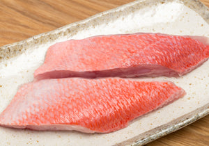 Two raw Snapper Fillets displayed on a plate. King George's Steaks and Seafood.